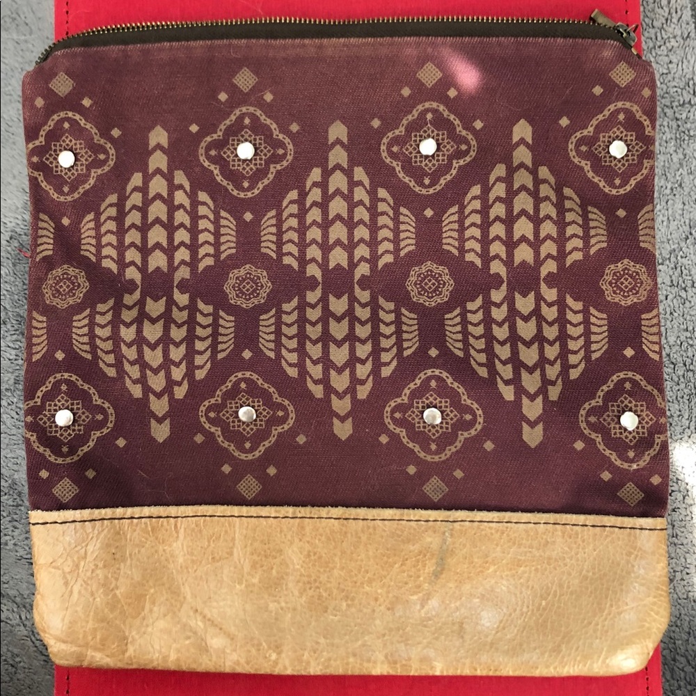 Purple tribal folded clutch bag